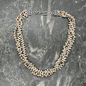 Torsade of Small Head Drilled Champagne Freshwater Pearls